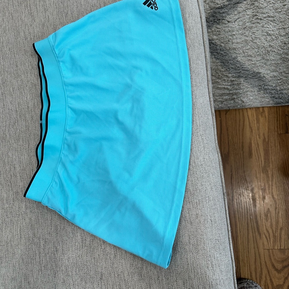 Flirty fun tennis/pickleball skirt in turquoise!